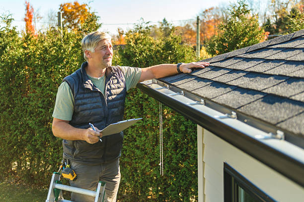 Professional Roofing technician working in Julian, NE